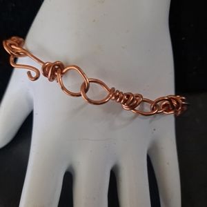 New Copper handcrafted bracelet measures 7 1/4". Charms can be added